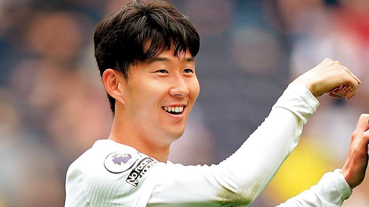 Son scores as Spurs go atop EPL table