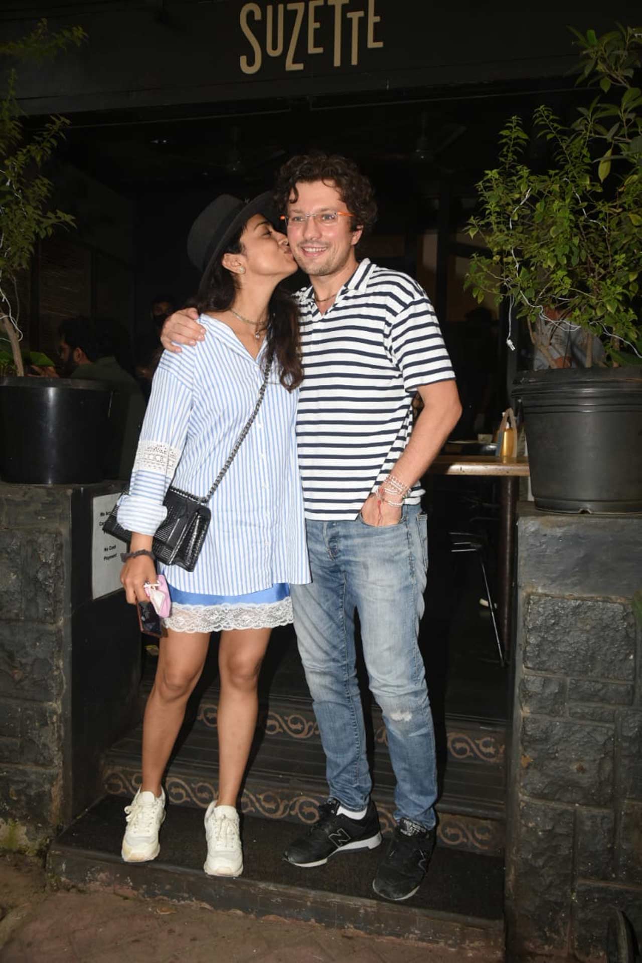 Shriya Saran and Andrei Koscheev were clicked in PDA, as they stepped out in Bandra, Mumbai. Shriya was seen wearing a denim skirt, which she paired with a white shirt.