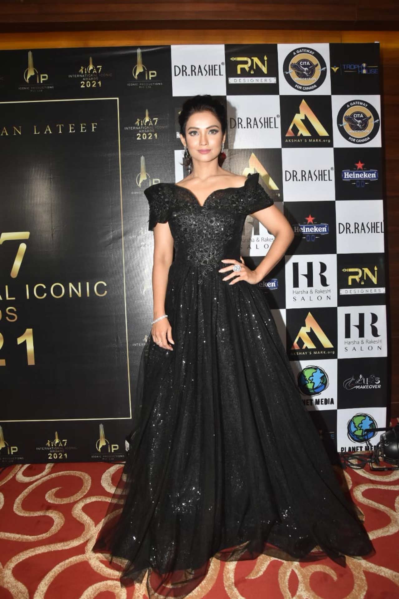 It seems like Adaa Khan unveiled her inner princess in this off-shoulder black gown for the award ceremony.