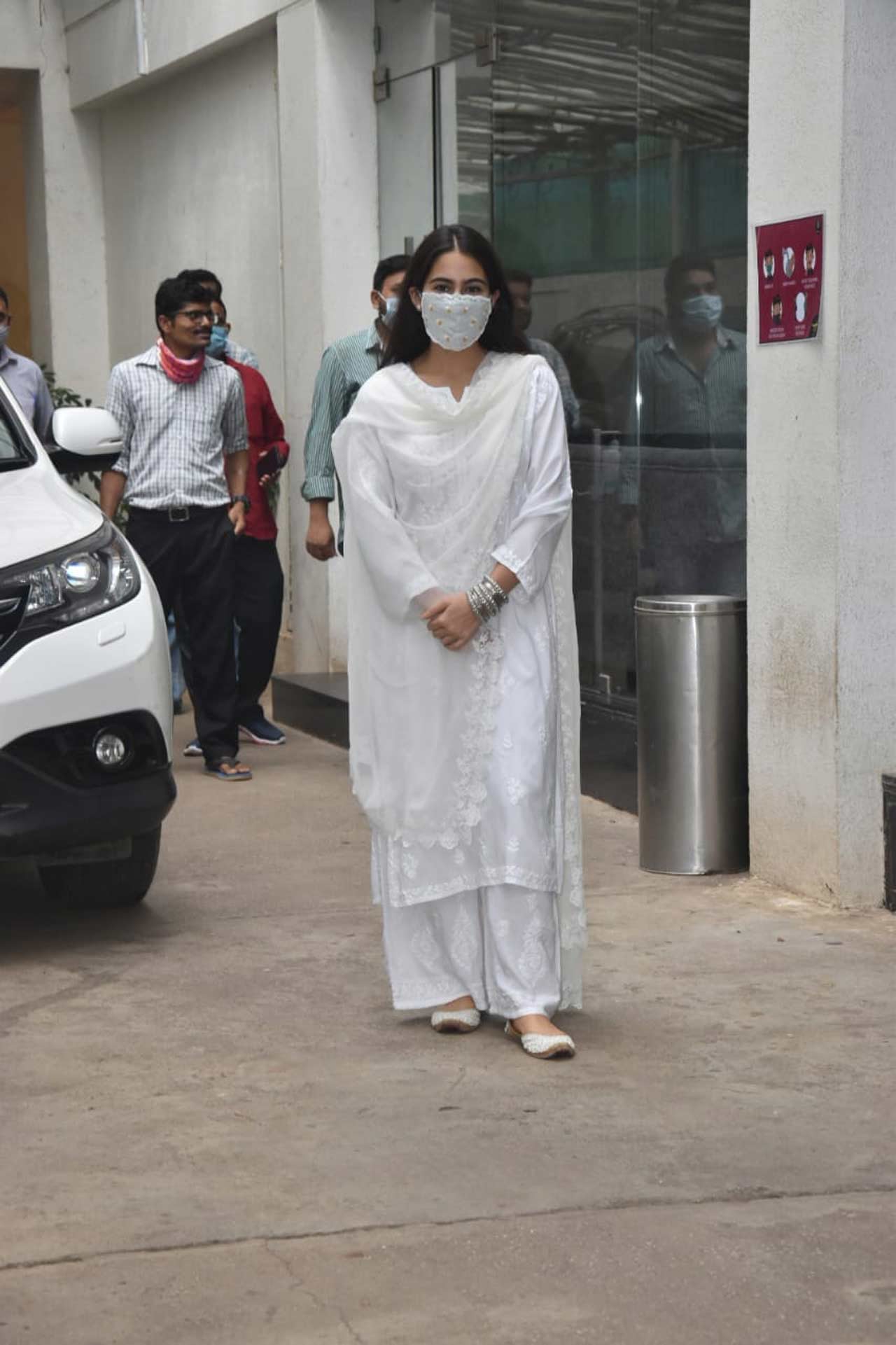 Sara Ali Khan was clicked in a white tradional attire and all masked up. Khan is currently vacationing in Ladakh along with actor Radhika Madan and musician Jasleen Royal. The 'Kedarnath' star's Ladakh diaries have redefined what a truly peaceful vacation looks like. In one of herInstagram posts, on Saturday, Sara shared a string of images and video clips from the trip. 