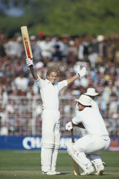 David Gower acknowledges the crowd after his hundred during a Test match between India and England