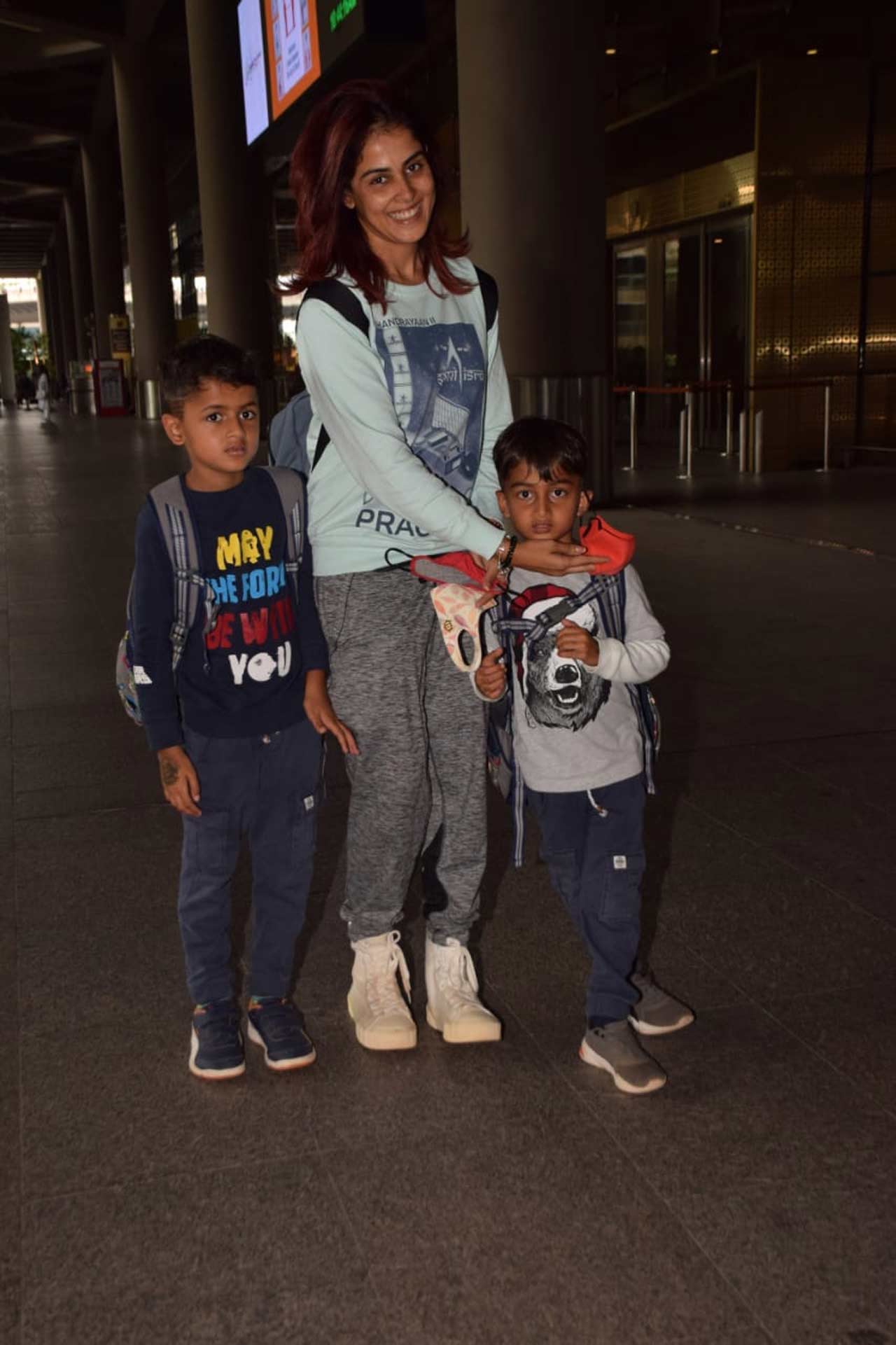 Genelia Deshmukh was all smiles when snapped by the shutterbugs at the Mumbai airport with kids.