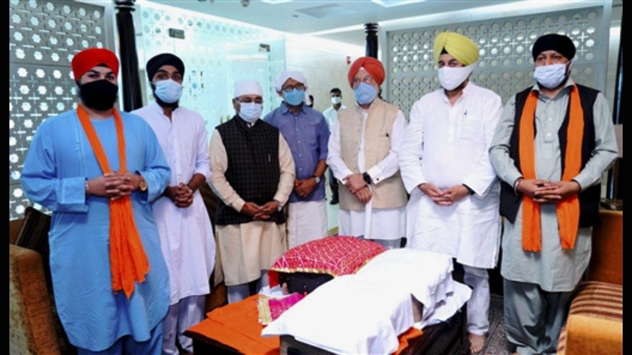 3 copies of Sikh scripture, 44 Afghan Sikhs flown into India from Afghanistan
