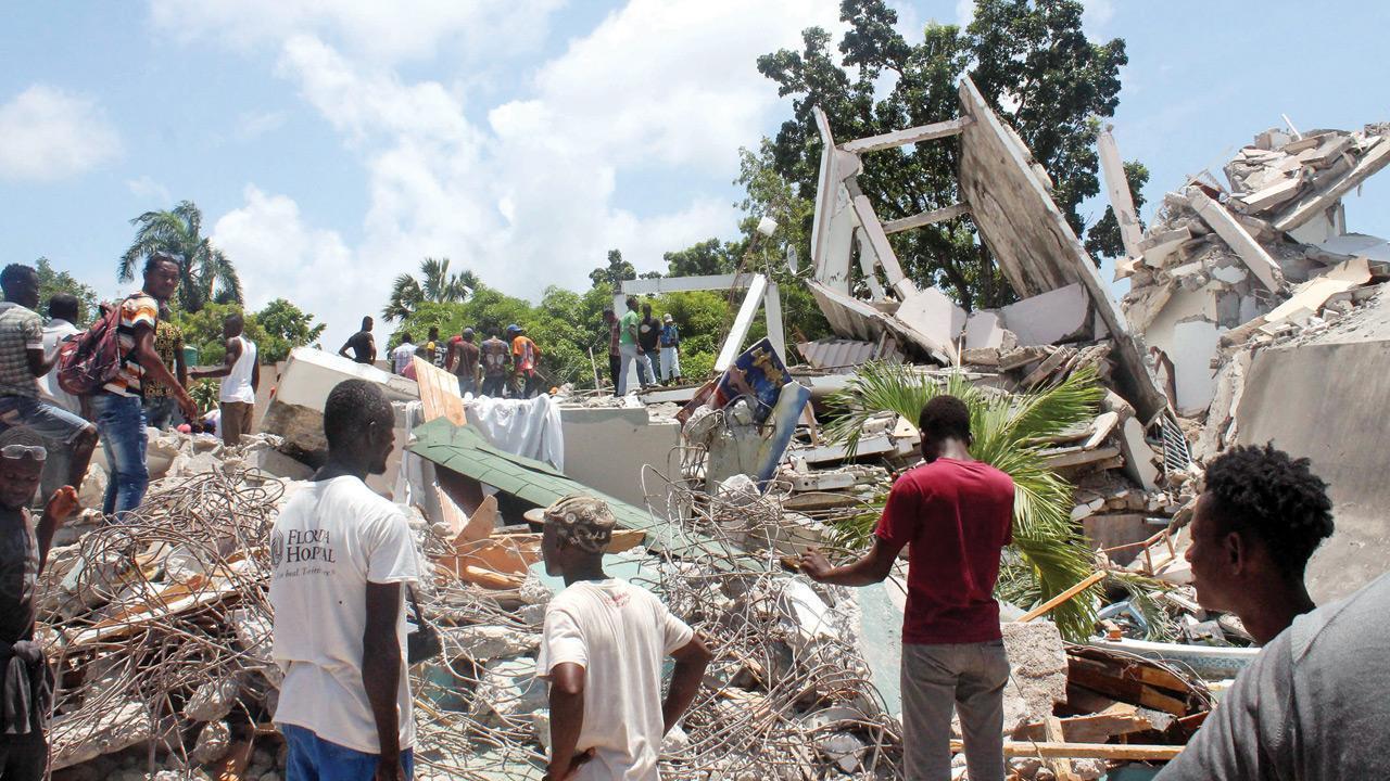 Haiti raises earthquake death toll, passes 2,200