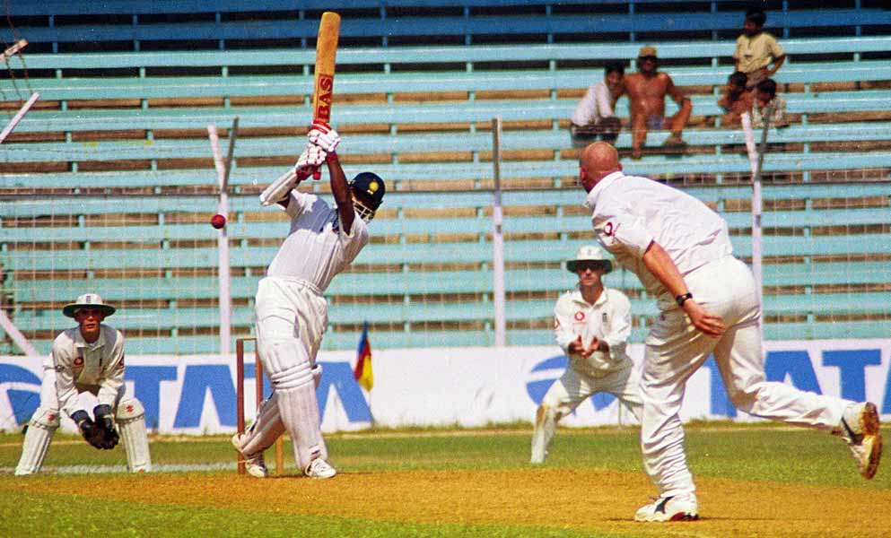 Vinod Kambli lofts the ball for a six during a Test match between India and England