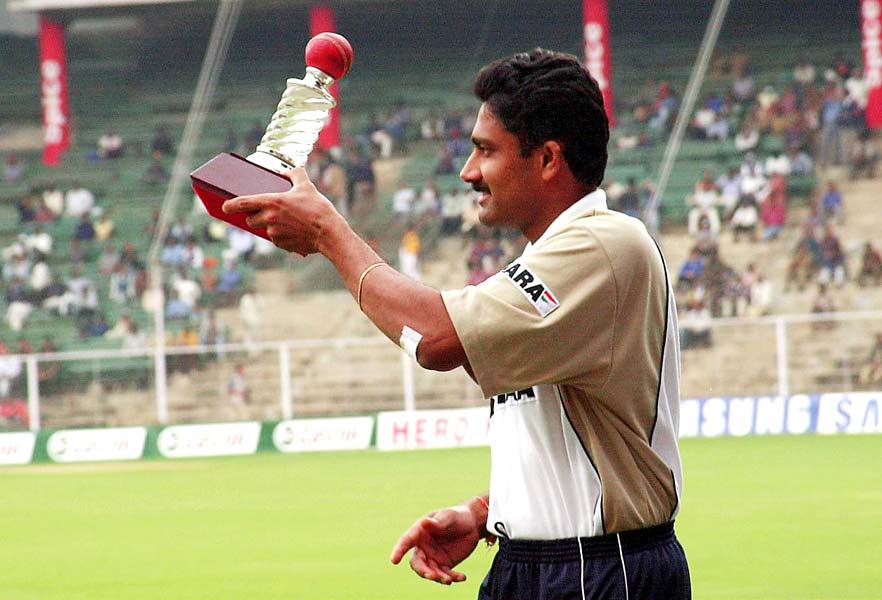 Indian spin legend Anil Kumble seen here receiving a trophy for his performance during a series against England