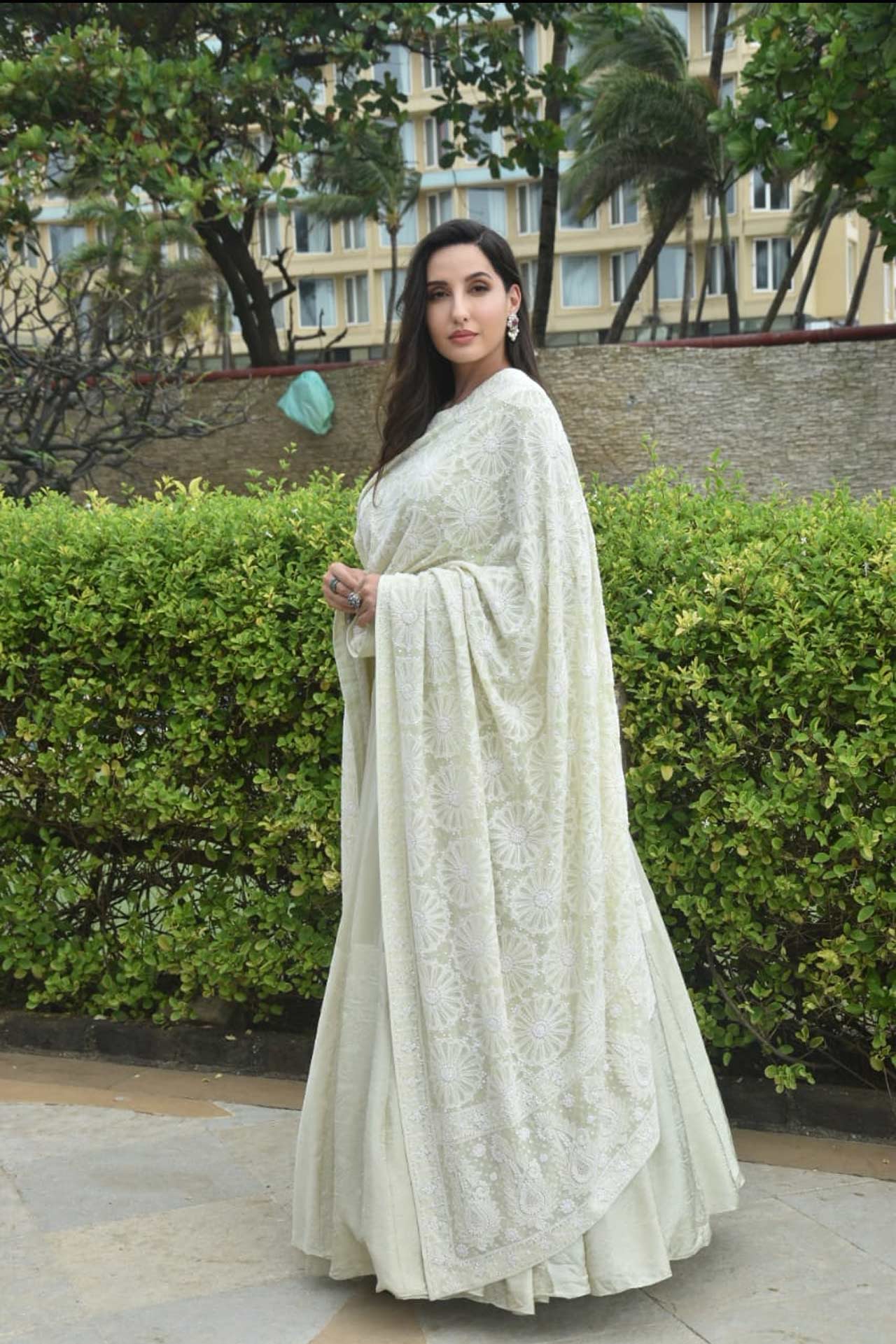 Nora Fatehi was clicked all dressed up in white ethnic wear as she stepped out for a shoot in Juhu, Mumbai.