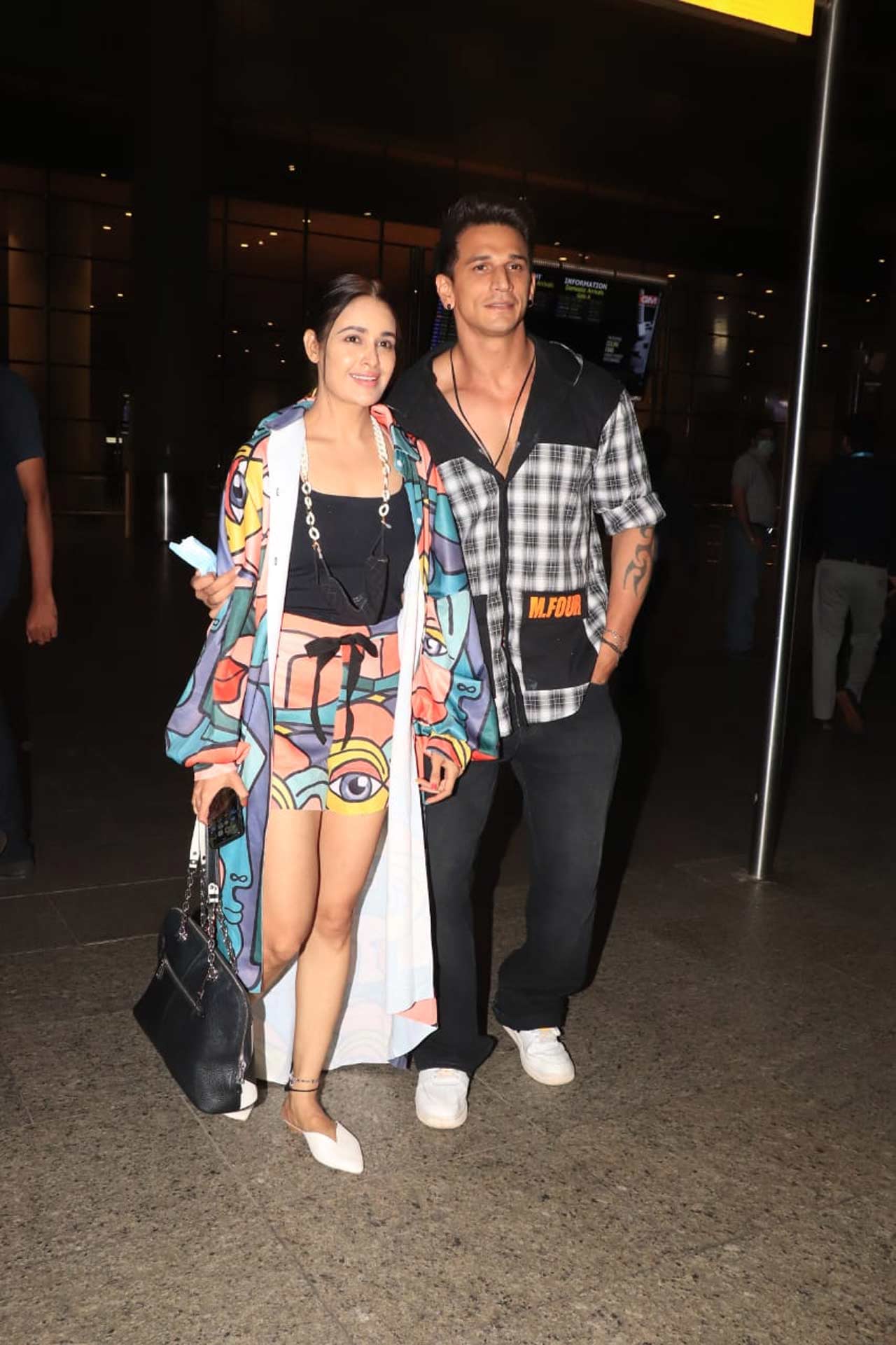 Prince Narula and Yuvika Choudhary posed for the shutterbugs when snapped at the Mumbai airport.