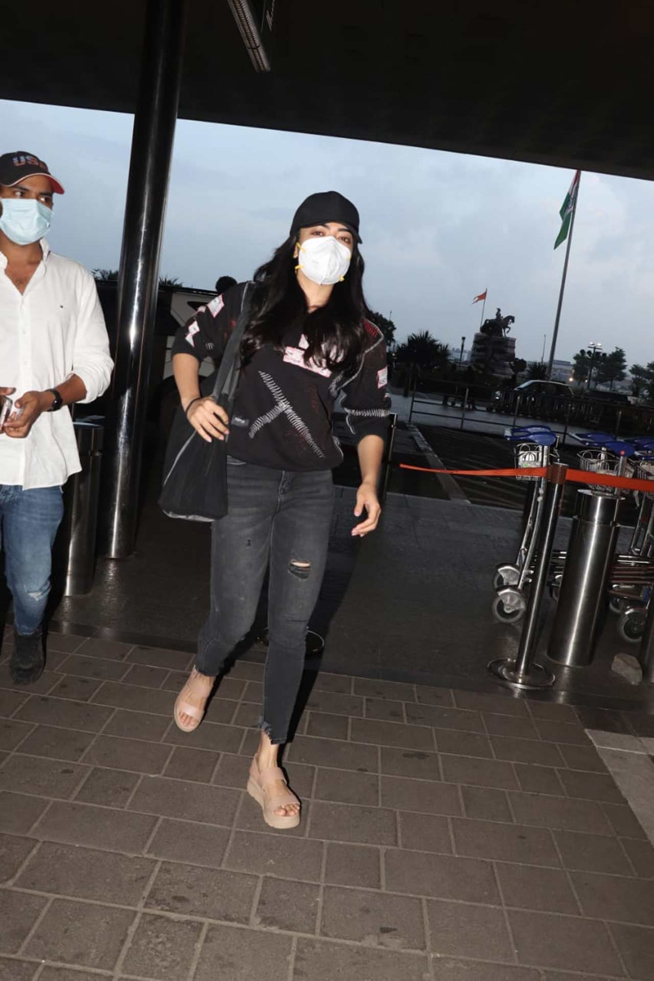 Rashmika Mandanna, who is said to make her Bollywood debut opposite Sidharth Malhotra with Mission Majnu, posed for the paparazzi when snapped at the Mumbai airport. 