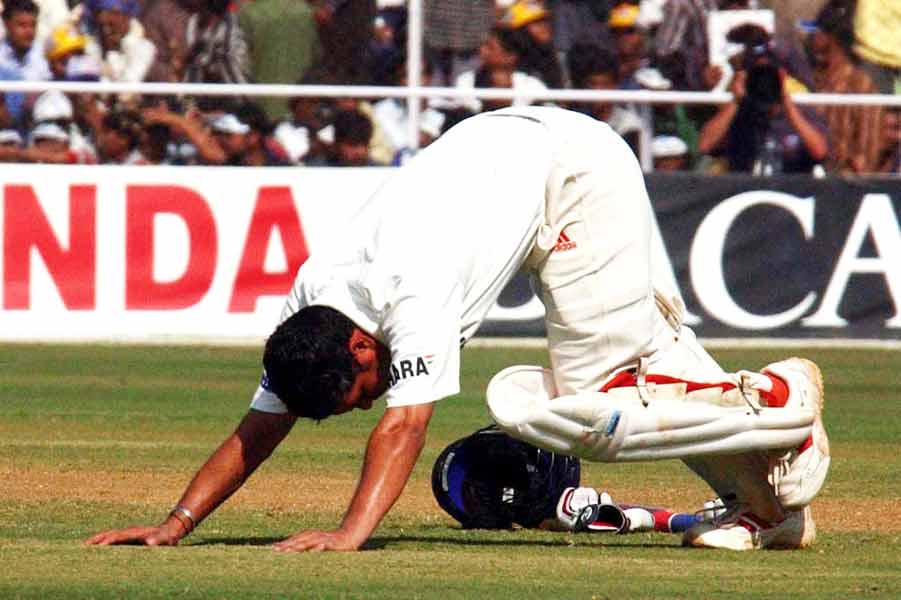 Sachin Tendulkar stretches during a Test match between India and England