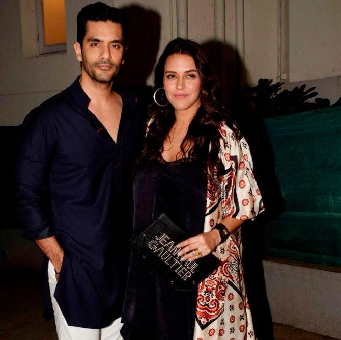 Neha Dhupia and husband Angad Bedi arrive for producer Ronnie Screwvala's party at his residence in Mumbai. All pictures/Yogen Shah