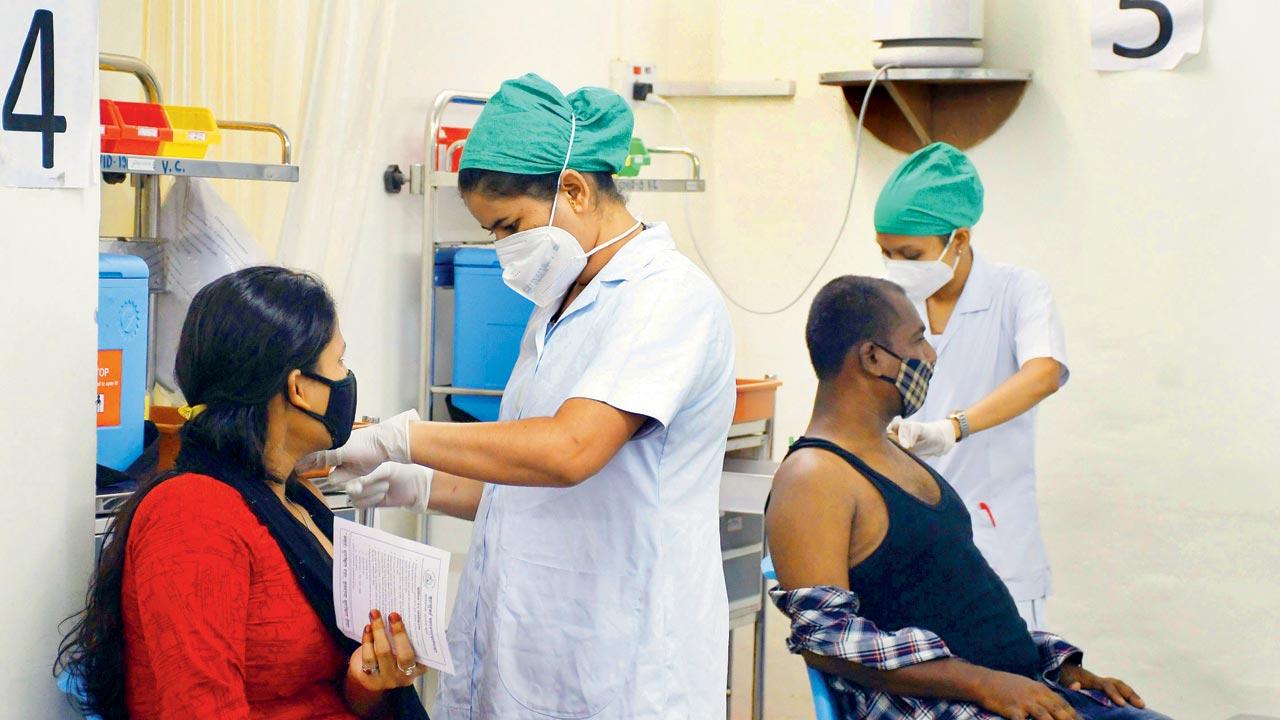 Beneficiaries receive vaccine doses at Nair hospital on Wednesday. Pic/Ashish Raje