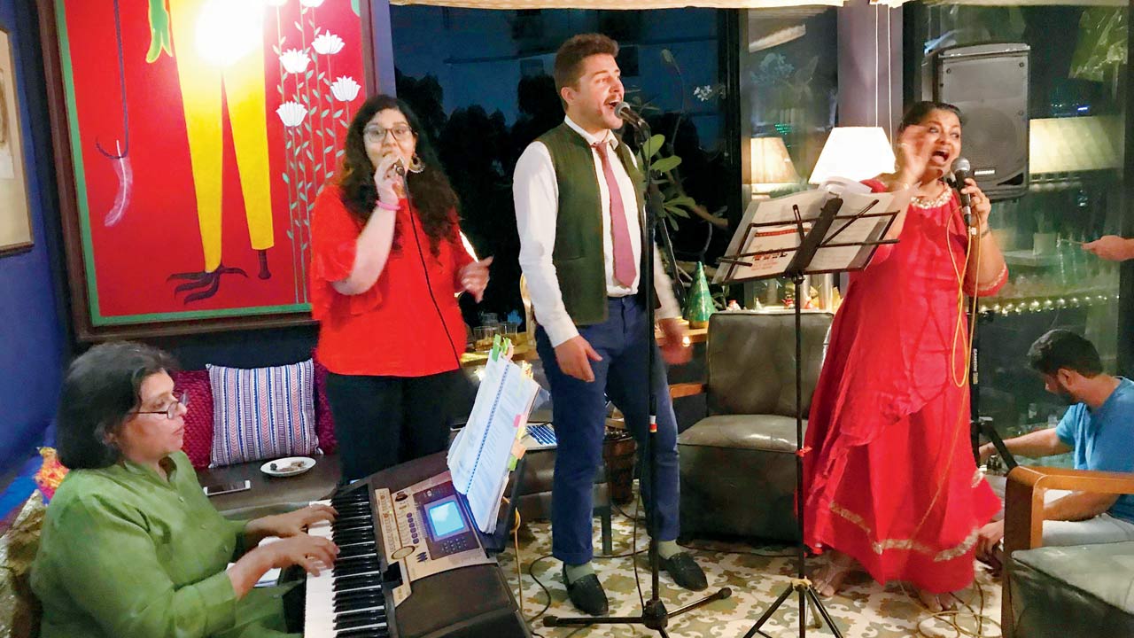 Marie Paul and her choir singing at Srila Chatterjee and Mahesh Mathai’s home  on Christmas