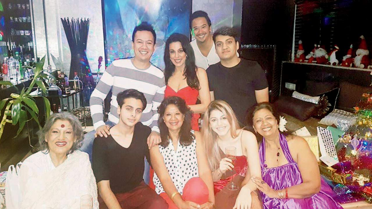 (Seated from left) Dolly Thakore, Omar Furniturewala, Ashita Tham, Alaya  Furniturewala, Monica Gupta; (Standing  from right) Ryam Tham, Pooja Bedi, Keenan Tham and a friend