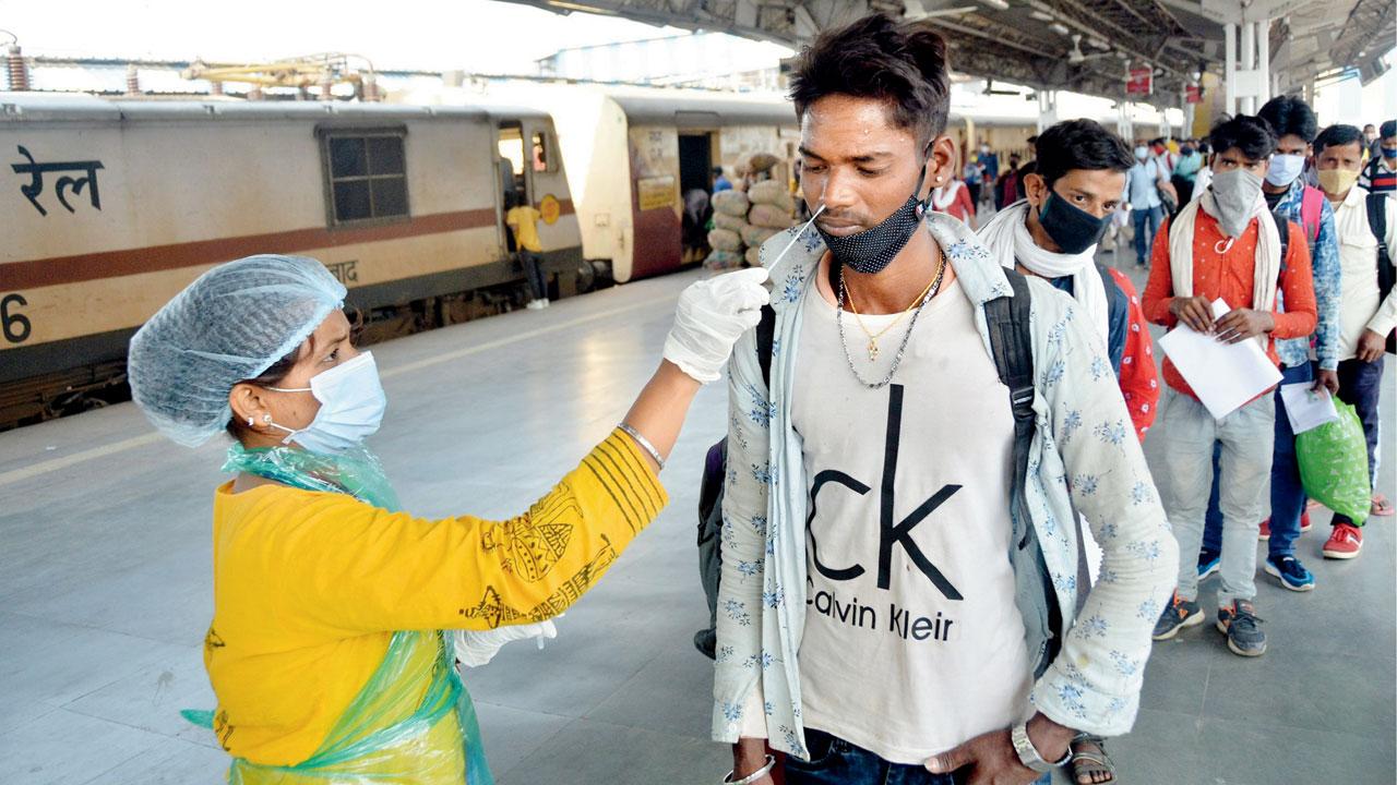A health worker collects a sample at LTT on Thursday. Pic/Sayyed Sameer Abedi