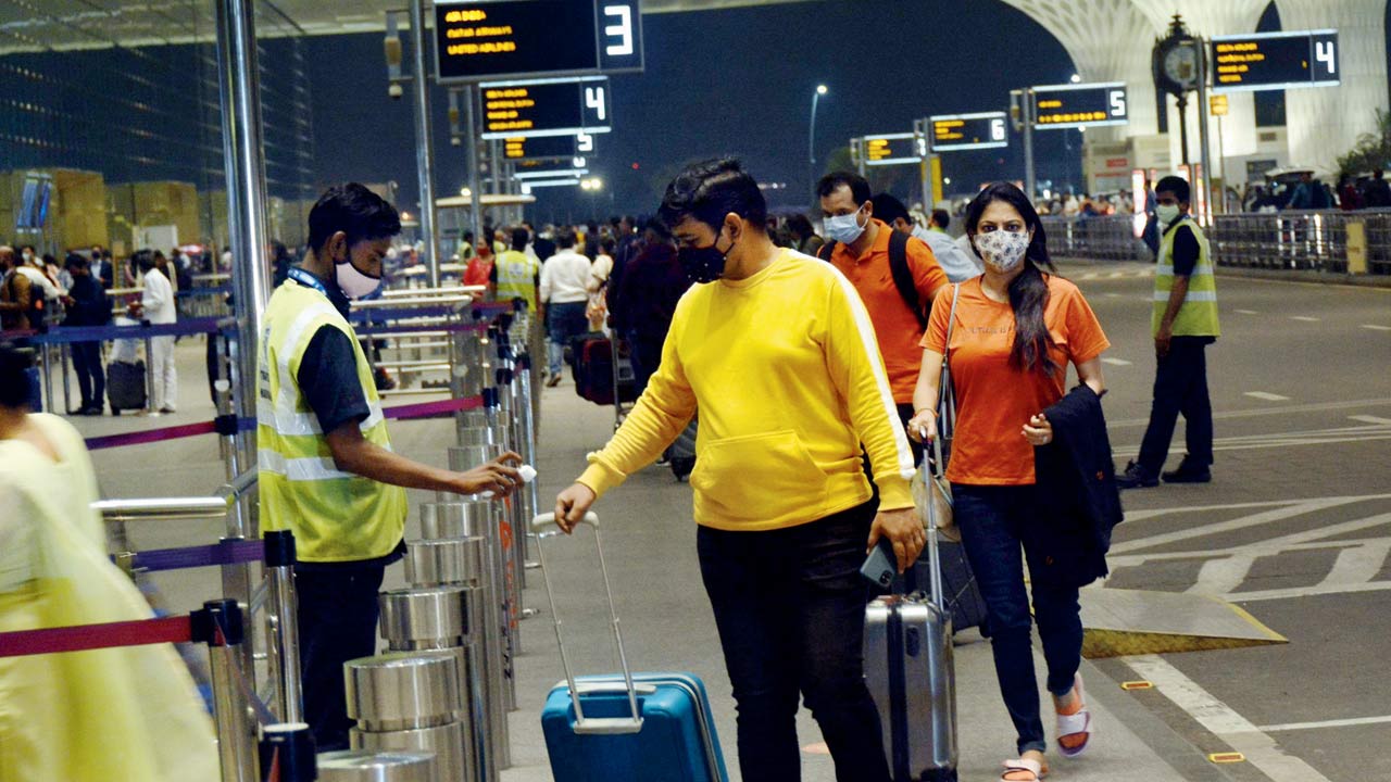 Passengers are being screened before being allowed on planes at the Mumbai International Airport on Monday. Pic/Sayyed Sameer Abedi