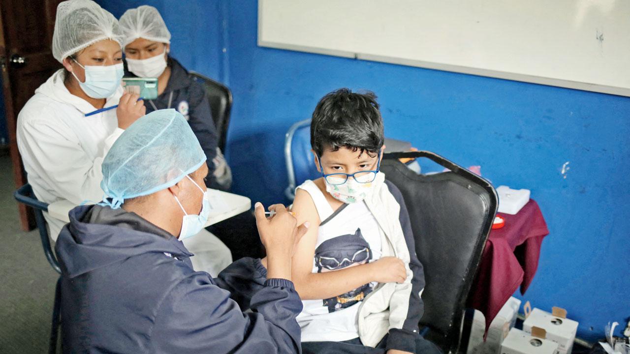 With schools reopening, kids can take back infection home, say few experts. Pic/AFP