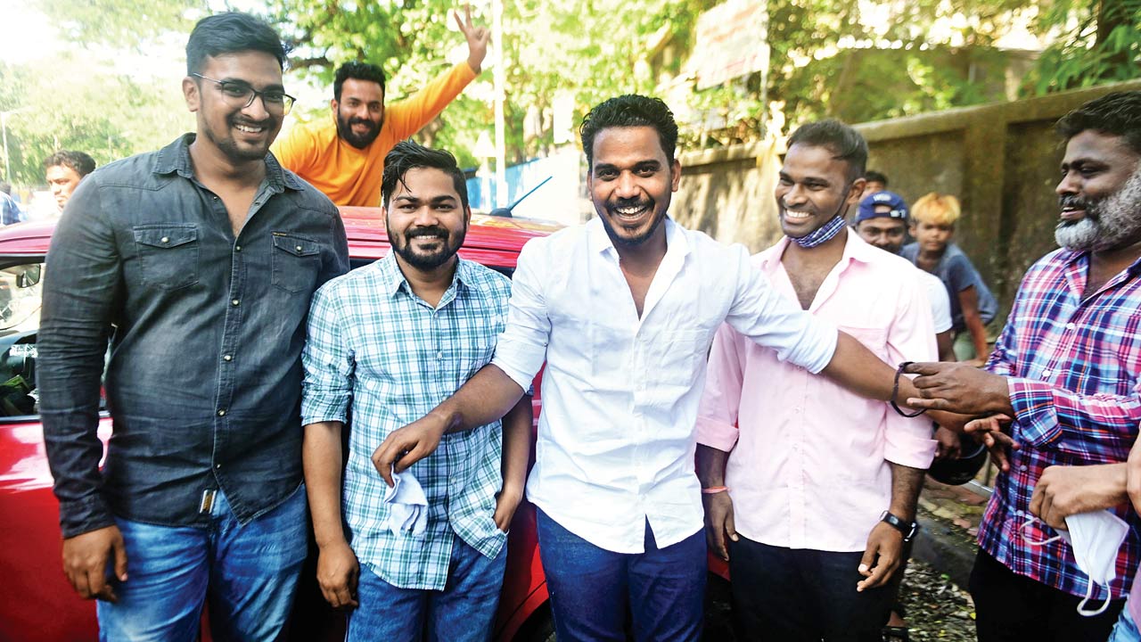 The duo with friends at Matunga Labour Camp