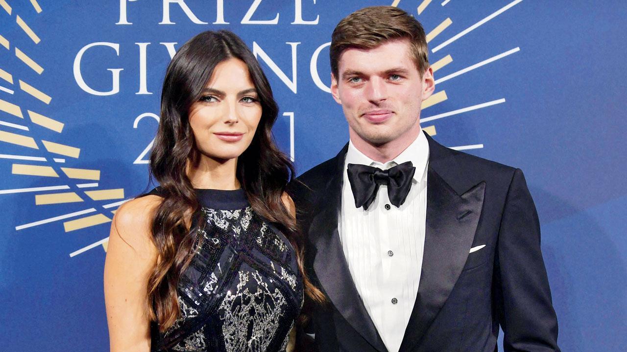 Max Verstappen celebrates at FIA event which Lewis Hamilton skips