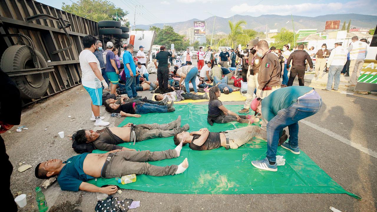 53 die in horror crash of truck smuggling migrants in Mexico