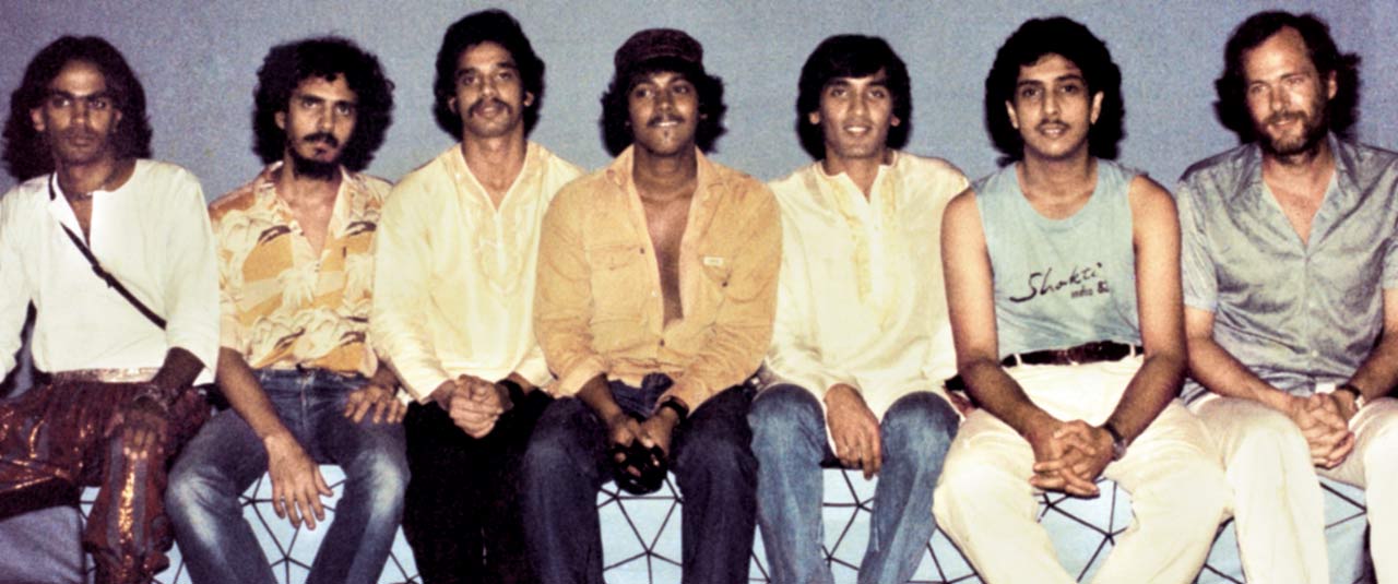 Infinite Fusion, the live band with whom he performed. Backstage with celebrated musicians (left to right) Remo (vocals, guitar and flute), Dinsha Sanjana (keyboards), Taufiq Qureshi (tabla), Miles Perry (bass), Rajesh Jhaveri (sitar), Ranjit Barot (drums), Dallas Smith (saxophone and lyricon)