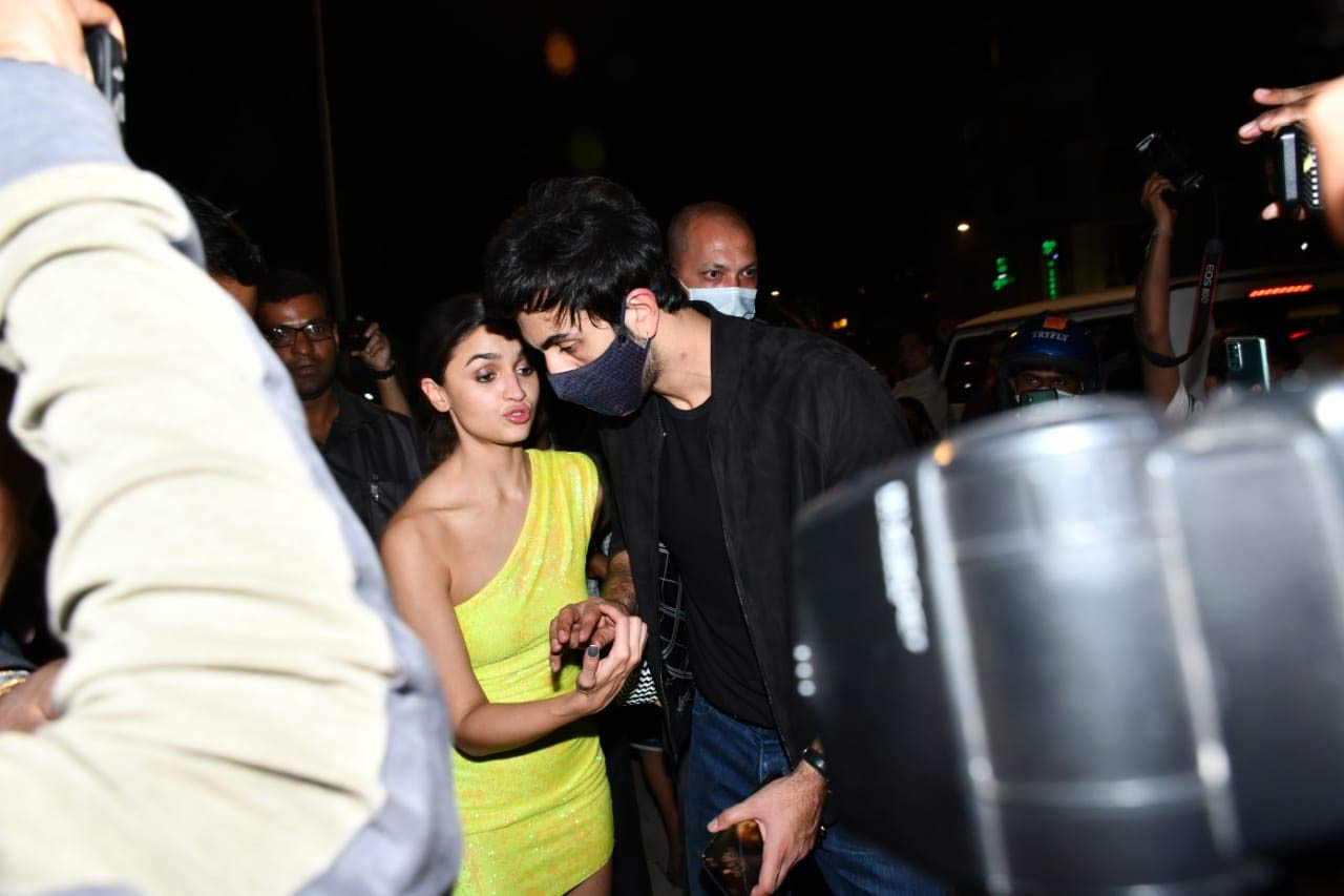 Ranbir Kapoor was seen protecting his girlfriend Alia Bhatt from the crowd that gathered the duo as they left the restaurant.