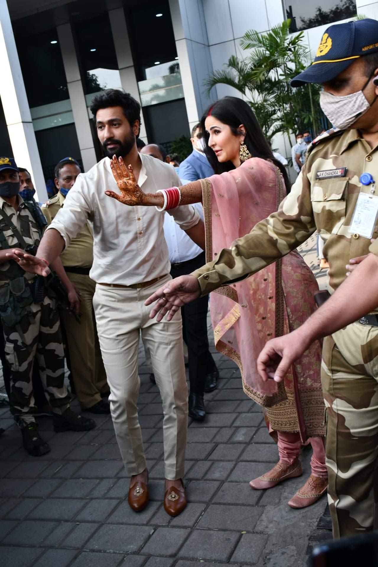 When Katrina Kaif and Vicky Kaushal made their first public appearance after their intimate wedding in Rajasthan, the duo was caught off guard as they posed for the shutterbugs. It seems like Katrina and Vicky, both were trying to save someone from the fall, by warning them with an immediate reaction. 