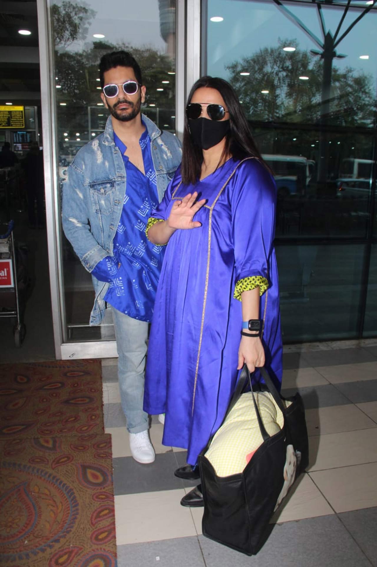 Bollywood power couple Angad Bedi and Neha Dhupia were also snapped posing for the shutterbugs as they left to attend the wedding. The duo's name has been circulating online as one of the special guests at the ceremony. Angad and Neha were seen twinning in blue silk outfits. 