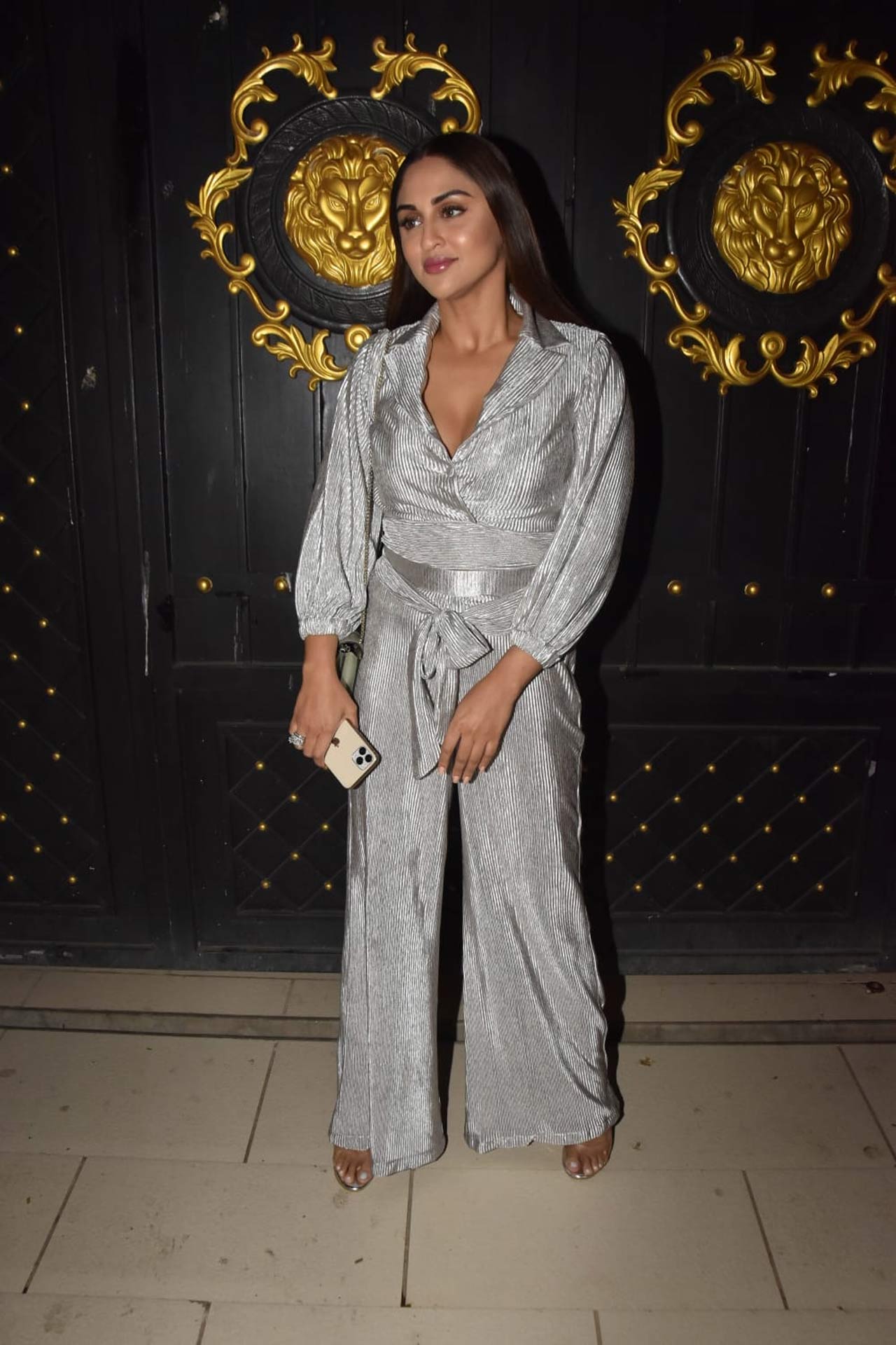 Krystle D'Souza looked no less than a party ball in this silver-coloured jumpsuit as she attended the party. On the work front, the actress was last seen in 'Pinjara Khubsurti Ka.'