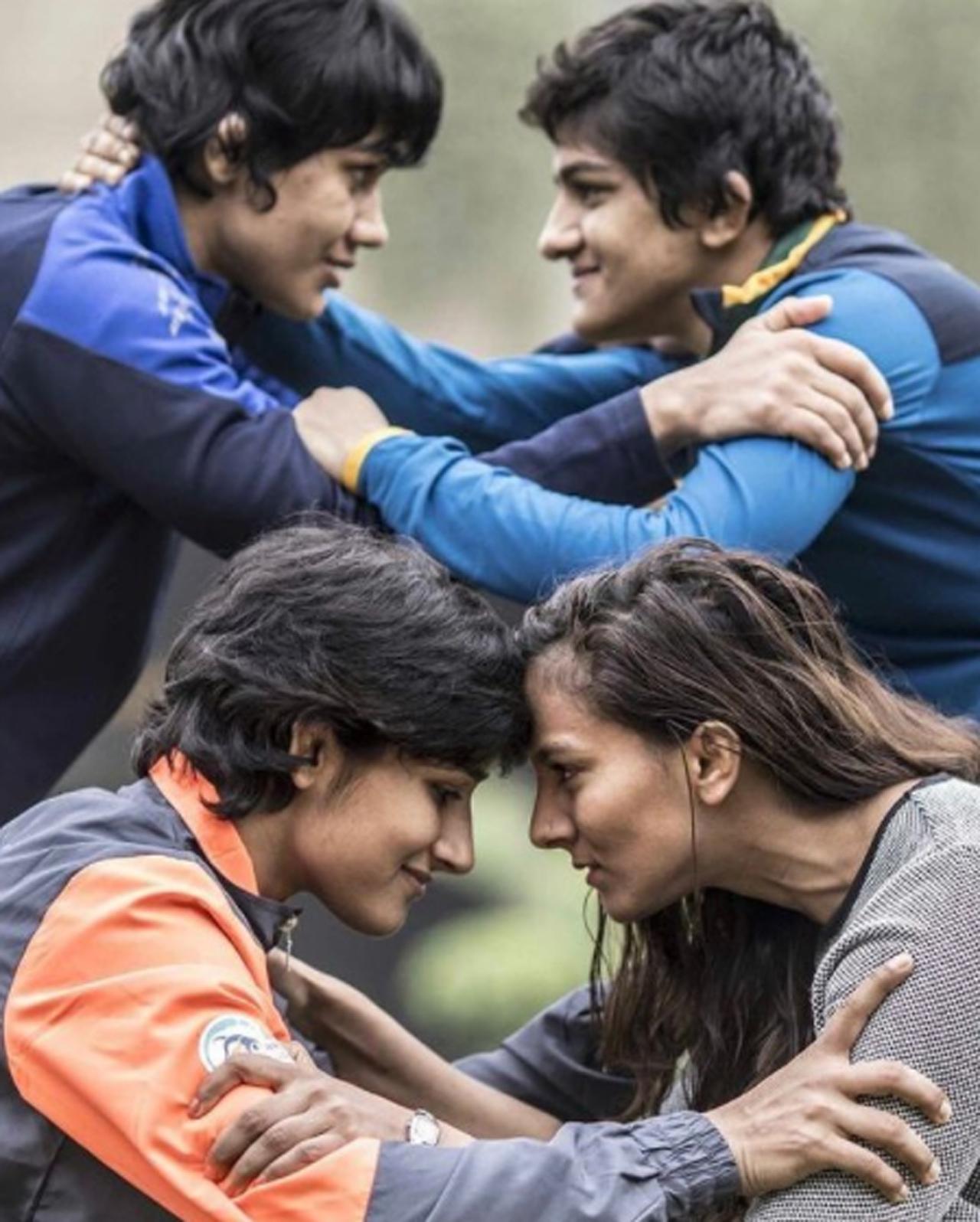 At the 2012 Summer Olympics, Geeta Phogat had a shot at the bronze medal but lost. In pic: With her sisters