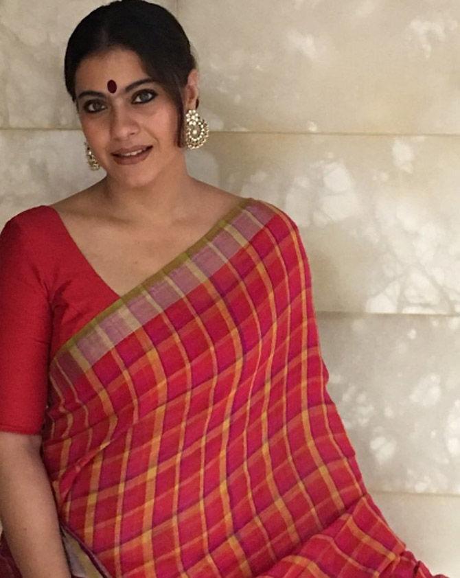 Kajol looks ravishing in this red sari