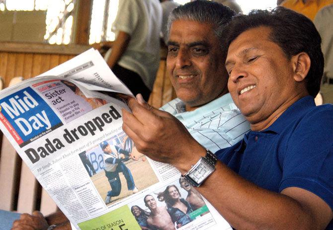 In picture: Kiran More (right) and senior selector Sanjay Jagdale seem to be amused by something in an edition of Mid-Day, while watching the Ranji match between Mumbai and Uttar Pradesh at the Wankhede Stadium.