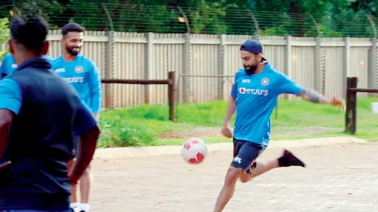 Skipper Virat Kohli plays footvolley with teammates at Johannesburg