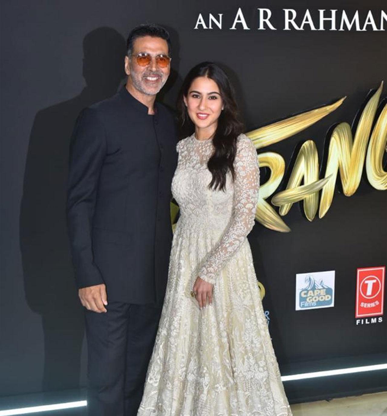 Akshay Kumar and Sara Ali Khan were all smiles at the music launch of their upcoming film Atrangi Re. Details of Kumar's role have been kept under wraps. The star looked dapper in a black suit and Sara shone in her traditional avatar.