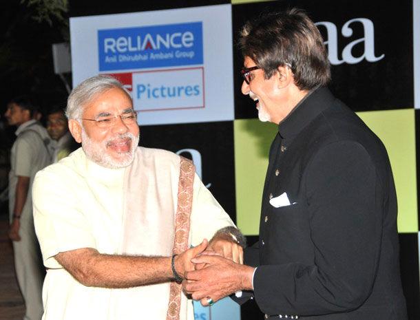 Narendra Modi and Amitabh Bachchan share a light moment at a multiplex in Gandhinagar, about 30kms from Ahmedabad in Gujarat on January 6, 2010. Pic/AFP
