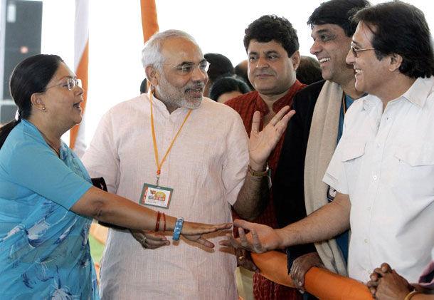 Vasundhara Raje Scindhia and Narendra Modi chat with former actor and BJP leader, late Vinod Khanna during the Bharatiya Janata Party (BJP) National Council meeting held in New Delhi on April 6, 2005. Also seen in the picture are 'Mahabharat' actors Gajendra Chauhan and Mukesh Khanna. Pic/AFP