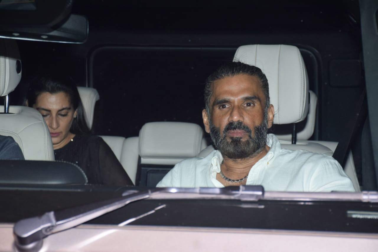 Suniel Shetty and Mana Shetty, who recently ruled the headlines during the Tadap screening, were also snapped at the private party. Suniel Shetty and Mana took over the social media when they posed for a happy family picture with KL Rahul, Athiya and Ahan Shetty and Tania Shroff.