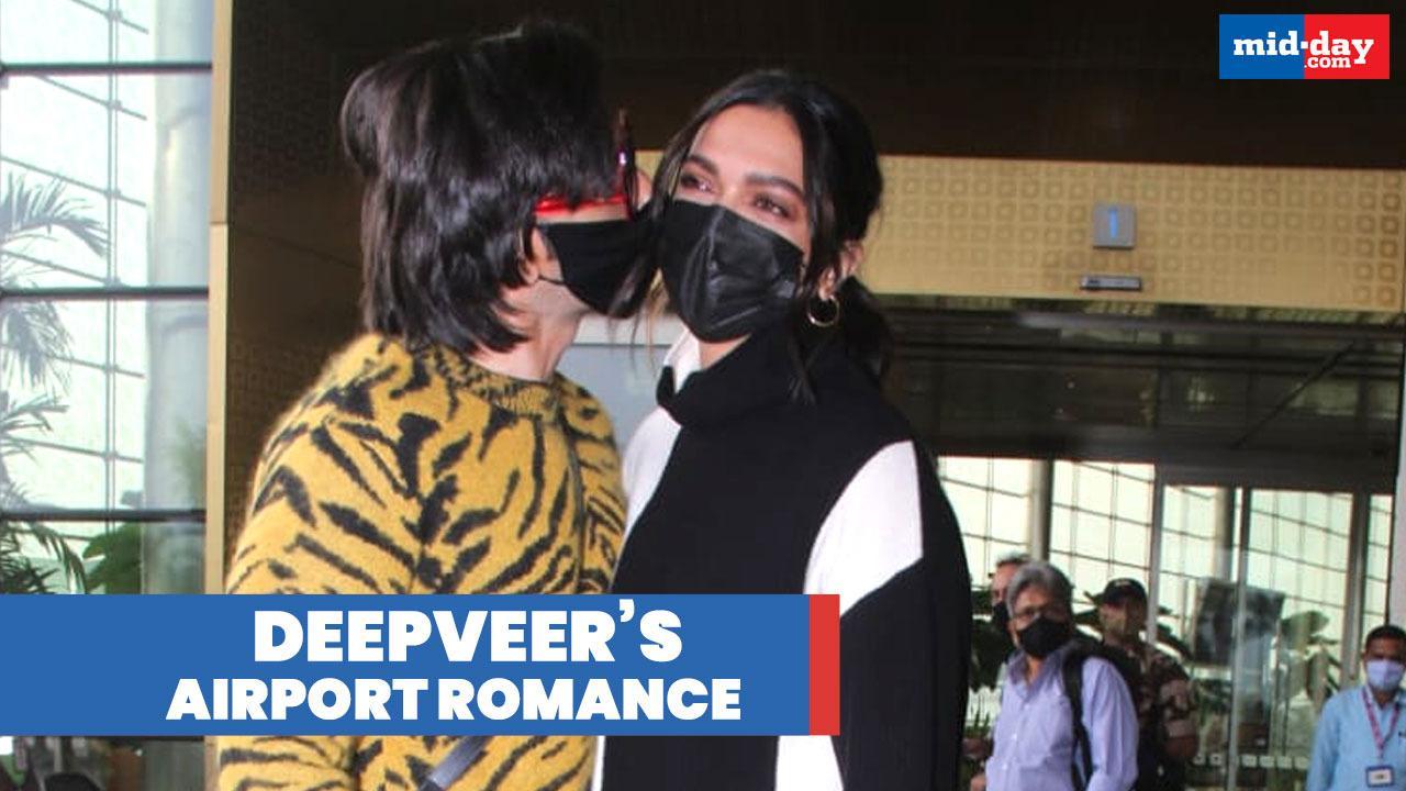 Ranveer Singh kisses wifey Deepika Padukone at the Airport & everybody goes aww!
