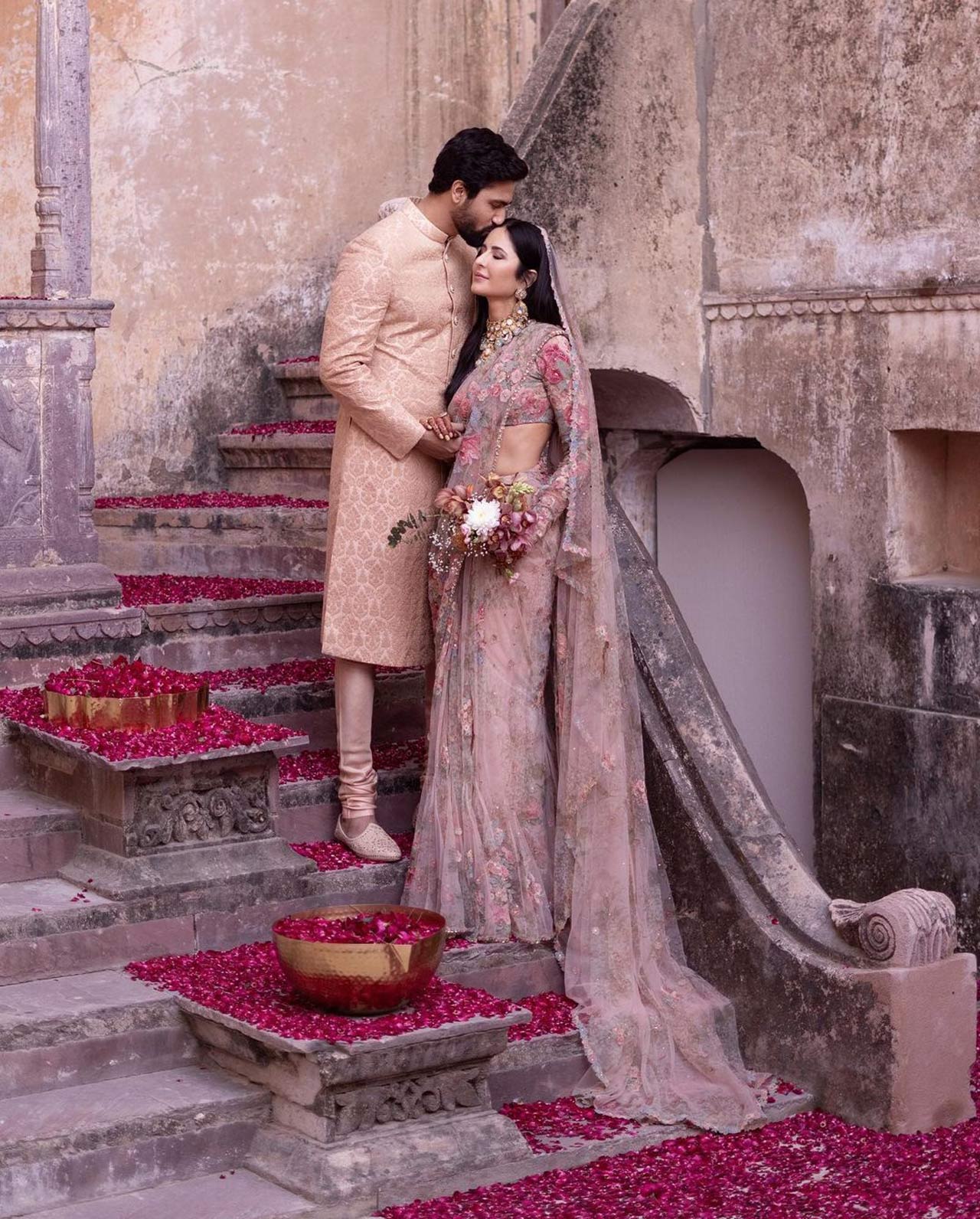 The couple took to their respective Instagram handles and shared a bunch of pictures posing together, and the duo looks no less than a prince and a princess, posing with the background of a fort, where the couple tied the knot. 
