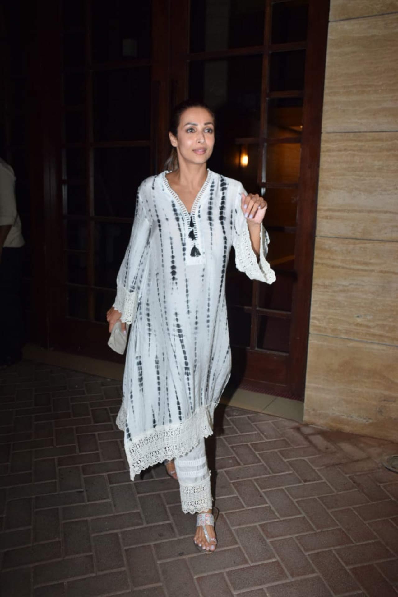 Malaika Arora stunned in a kaftan dress as she stepped out to attend Rhea Kapoor's party. The super fun get-together was also attended by their mutual friend and actor Amrita Arora as well as Kareena's manager Poonam Damania. Taking to her Instagram handle, Kareena shared glimpses of their fun time as they laughed, ate and posed for pictures.