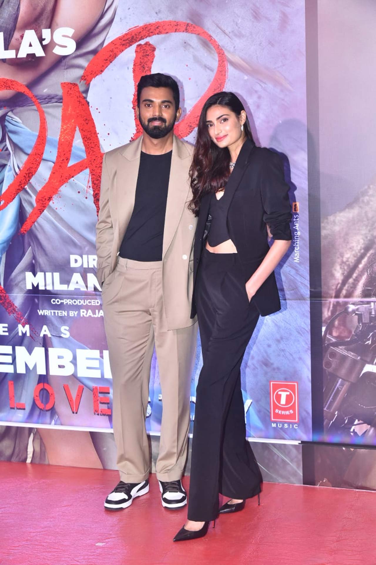 KL Rahul and Athiya Shetty made their public appearance together amidst relationship rumours at the screening. While KL Rahul opted for a casual suit, Athiya stunned in a black pantsuit as she attended the premiere.