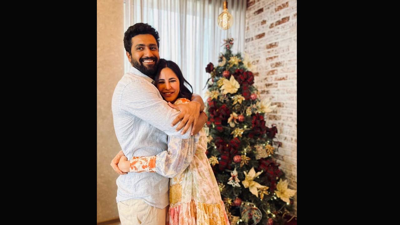 'Meri Christmas' shares Vicky Kaushal
newly married couple Vicky Kaushal and Katrina Kaif's Christmas celebrations! Taking to his Instagram handle, Vicky Kaushal treated fans to an adorable picture of himself with Katrina Kaif. The candid snap captures the duo sharing a warm hug as they pose in front of a X-Mas tree for their dreamy Christmas picture. Read the entire story here.