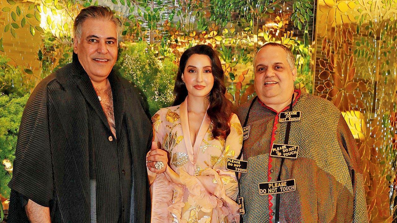 Photos inside: Designer Sandeep Khosla's 'Please do not touch' placard neckpiece is eye-catchy
