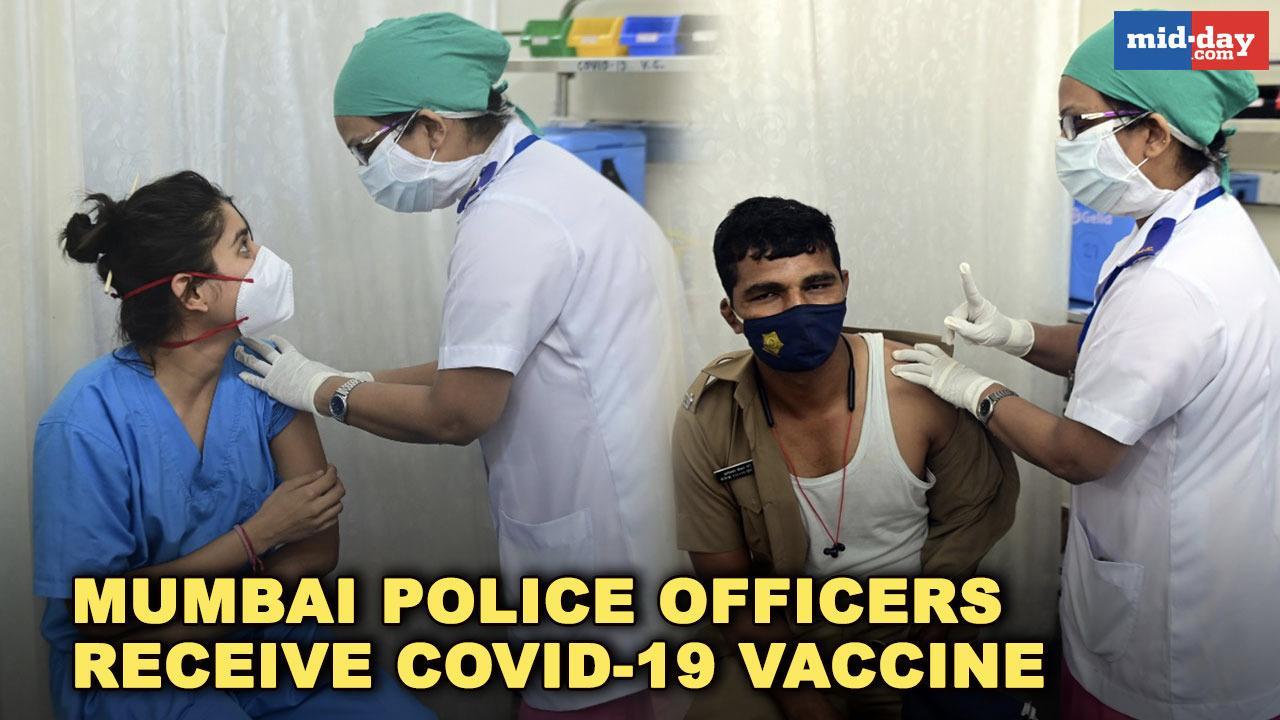 Mumbai police officers receive COVID-19 vaccine