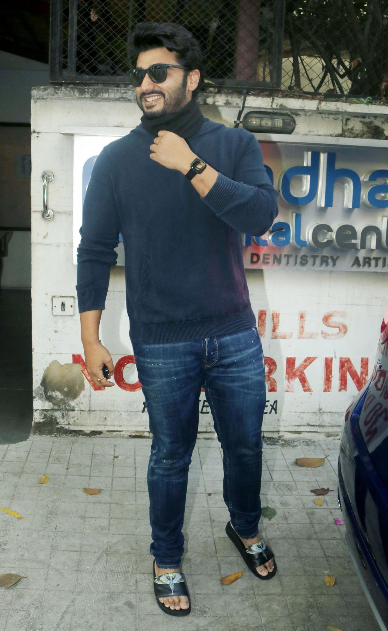 Arjun Kapoor, who was also clicked in Juhu, posed for the paparazzi during his stroll in the city. On the work front, Arjun will be next seen opposite Parineeti Chopra in Sandeep Aur Pinky Faraar, a dark comedy, which was earlier slated as a 2020 release.