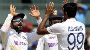 R Ashwin and Virat Kohli celebrate a wicket. Pic PTI