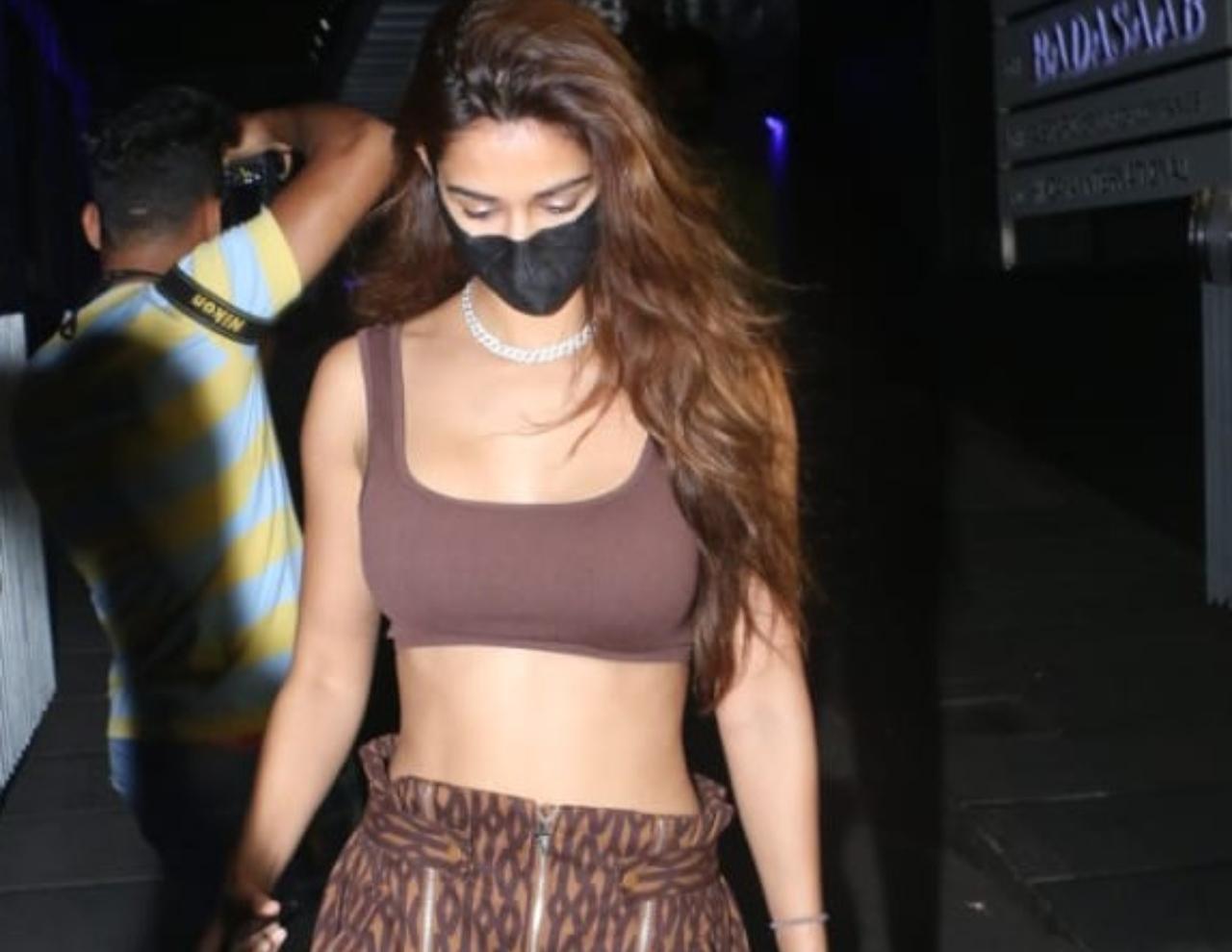 Disha Patani looked chic in her brown tube top and trousers as she was snapped at a popular restaurant in Bandra. The actress wore a black protective mask to prevent the spread of COVID-19.