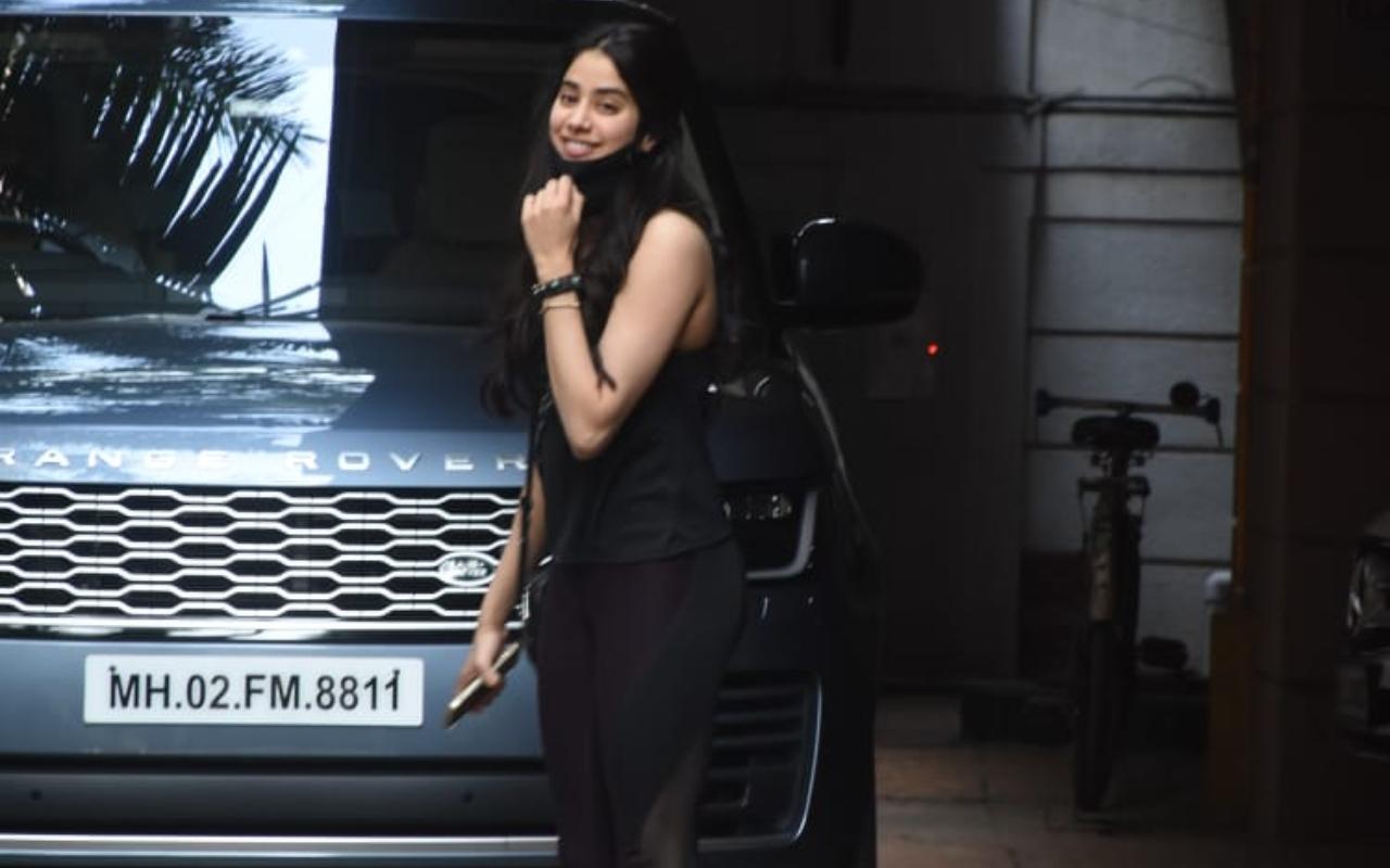 Janhvi Kapoor had a busy day in office. The actress was snapped at director Rajkumar Santoshi's residence in Juhu. The actress was meeting her BFF Tanisha Santoshi. (All pictures: Yogen Shah).