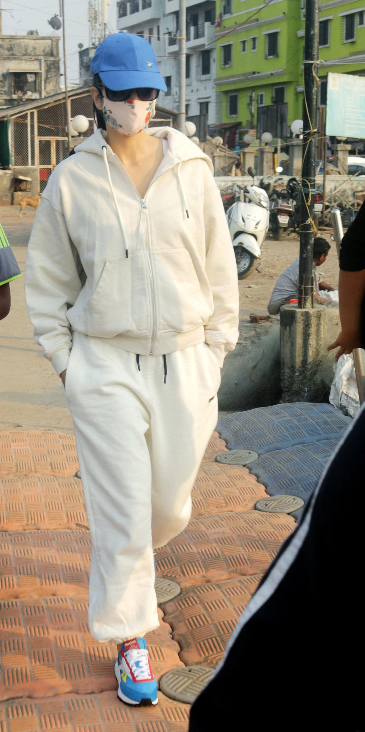 Katrina Kaif was clicked at Versova jetty, along with her Police Bhoot co-star Ishaan Khatter. The actress wore a comfortable tracksuit, sported a cap and multi-colour sports shoes.