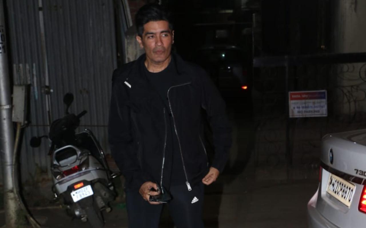 Manish Malhotra looked cool and stylish in his black t-shirt, jacket and pants.